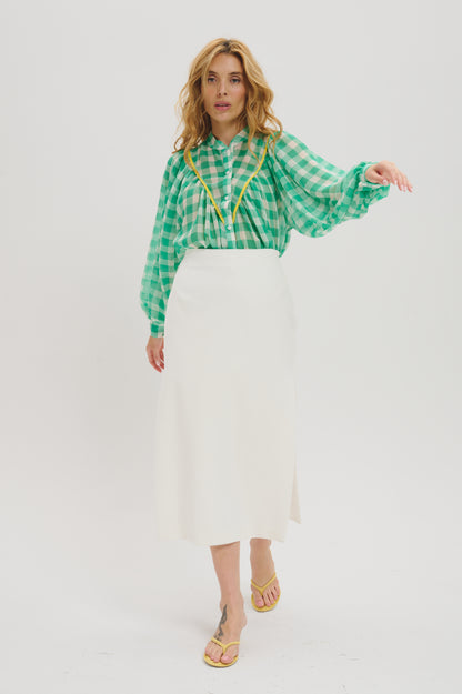 Edith in green and white