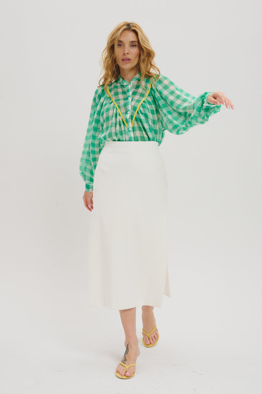 Edith in green and white