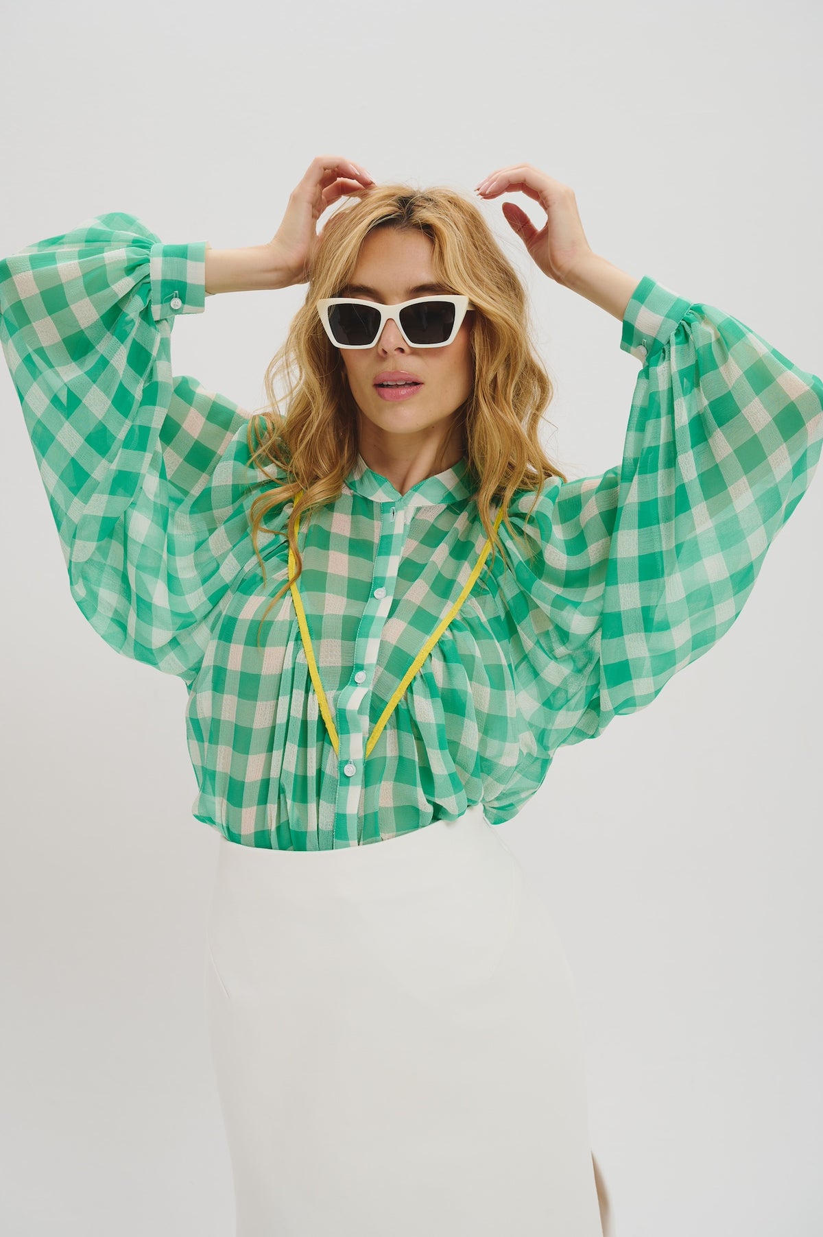 Edith in green and white