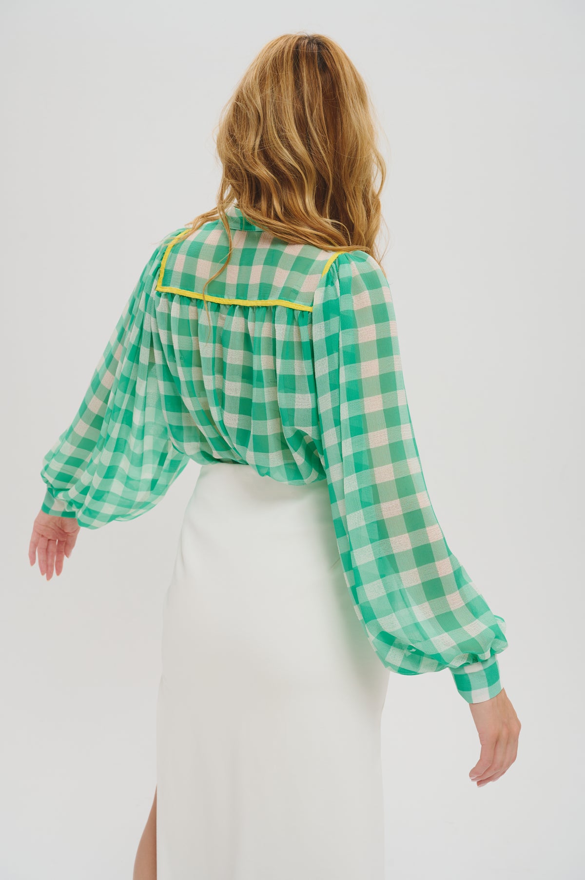 Edith in green and white