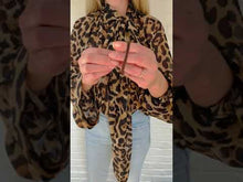 Load and play video in Gallery viewer, The Globe blouse in Leopard
